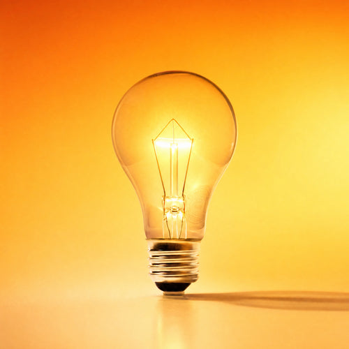 Longwave No. 2 — 40W incandescent bulb, lit, on warm orange